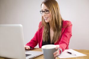 woman on computer doing school work